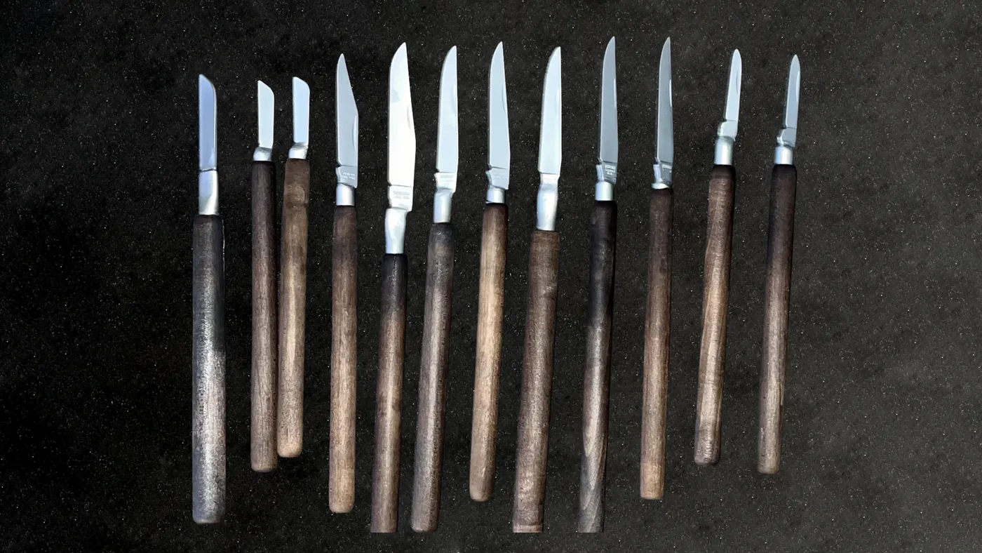 Wood and metal handle carving knives